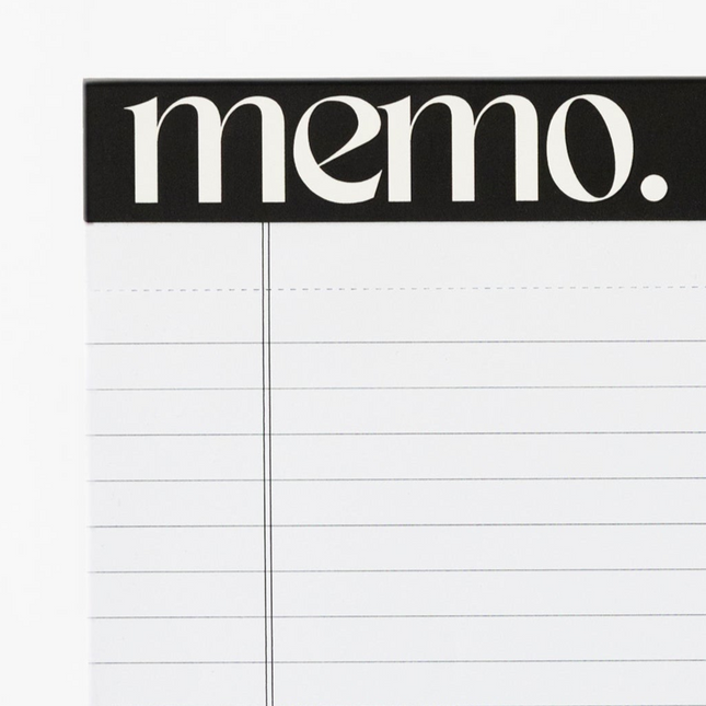 Embossed header feature of minimalist student notepad with ruled layout