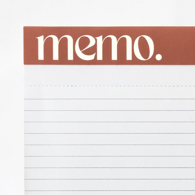 Embossed header feature of minimalist student notepad with ruled layout